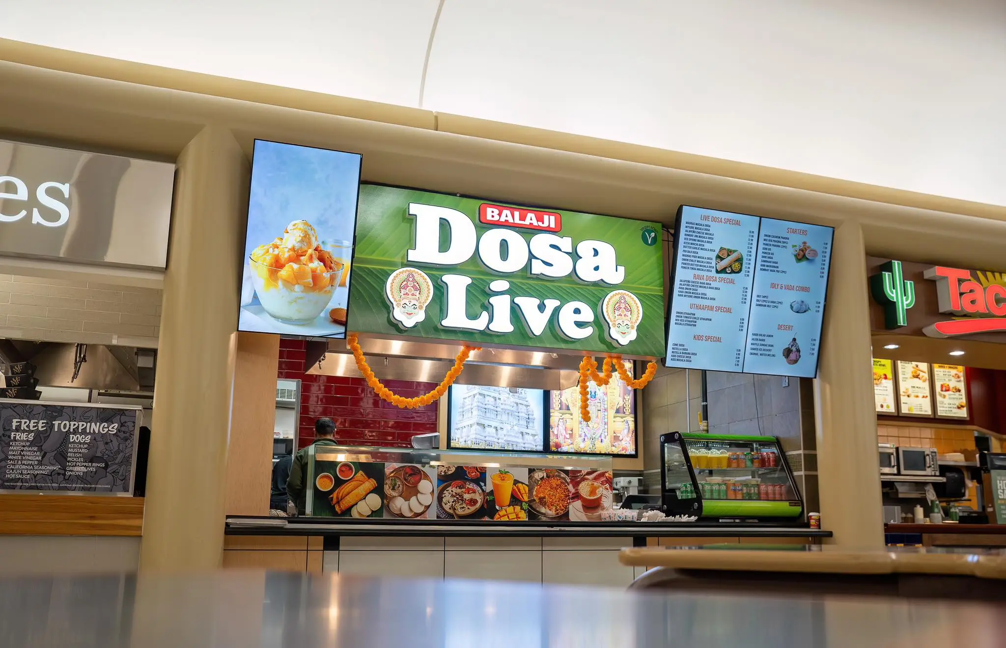 Fresh dosas made live on traditional tawa at Balaji Dosa Live - Authentic South Indian cuisine in Mill Woods Edmonton